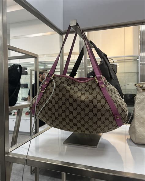 century 21 gucci bag|Inside Century 21's Reopened NYC Store: Gucci, Loewe & More.